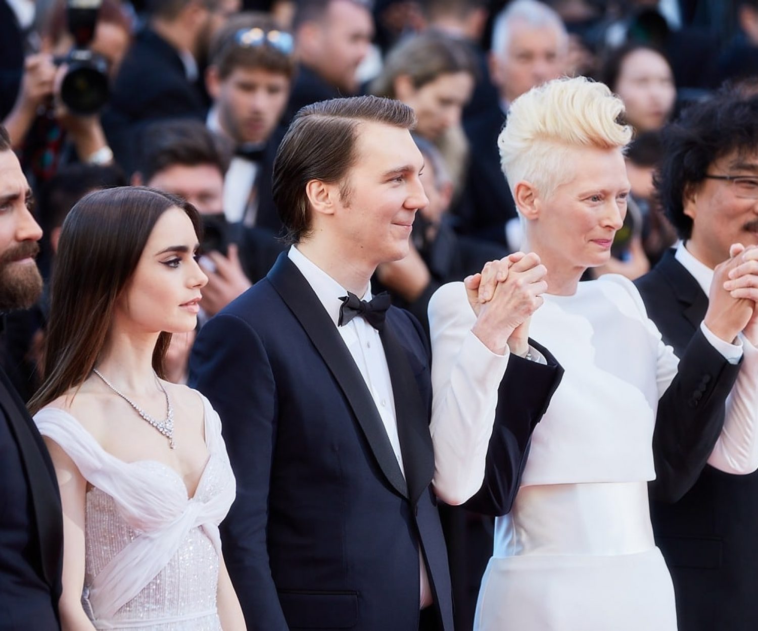 CANNES, FRANCE - MAY 19:  Actors Devon Bostic, Jake Gyllenhaal, Lily Collins, Paul Dano, Tilda Swinton, director Bong Joon-Ho attend the "Okja" screening during the 70th annual Cannes Film Festival at Palais des Festivals on May 19, 2017 in Cannes, France. (Photo by Kristina Nikishina/Epsilon)